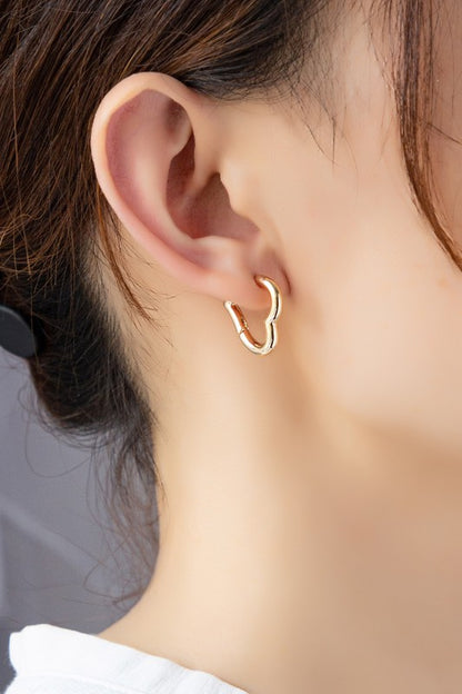 Heart shape hinged hoop earrings